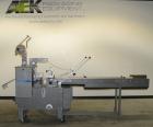 Used Doboy Scotty II Horizontal Flow Wrapper. Capable of speeds up to 75 packages per minute. Has 5' Long lugged chain infeed. Package size range: length 4
