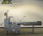 Used- Doboy Scotty II Horizontal Flow Wrapper. Capable of speeds up to 75 packages per minute. Has 5' Long lugged chain infe...