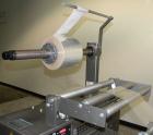 Used Doboy Scotty II Horizontal Flow Wrapper. Capable of speeds up to 75 packages per minute. Has 5' Long lugged chain infeed. Package size range: length 4