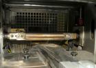 Used Doboy Scotty II Horizontal Flow Wrapper. Capable of speeds up to 75 packages per minute. Has 5' Long lugged chain infeed. Package size range: length 4