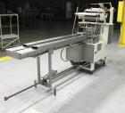 Used Doboy Model Scotty II Horizontal Flow Wrapper. Machine is capable of speeds up to 60 packages per minute. Has 6' Long lugged Carrier Style chain infeed on 12” centers. Package size range: (lengt...