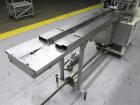 Used Doboy Model Scotty II Horizontal Flow Wrapper. Machine is capable of speeds up to 60 packages per minute. Has 6' Long lugged Carrier Style chain infeed on 12” centers. Package size range: (lengt...