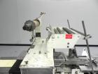 Used Doboy Model Scotty II Horizontal Flow Wrapper. Machine is capable of speeds up to 60 packages per minute. Has 6' Long lugged Carrier Style chain infeed on 12” centers. Package size range: (lengt...
