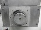 Used Doboy Model Scotty II Horizontal Flow Wrapper. Machine is capable of speeds up to 60 packages per minute. Has 6' Long lugged Carrier Style chain infeed on 12” centers. Package size range: (lengt...