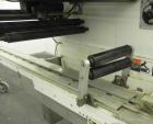 Used FMC Model WM20 SynchroFlo Horizontal Wrapper. Speeds up uo 300 packages per minute. 2 up cutting head, 1 1/2