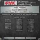 Used FMC Model WM20 SynchroFlo Horizontal Wrapper. Speeds up uo 300 packages per minute. 2 up cutting head, 1 1/2