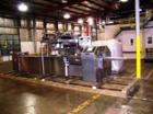 USED: FMC model WS-20 Series II horizontal wrapper. Dual land servo driven. All stainless steel wash down unit. Last ran meat patties.