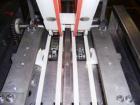 USED: FMC model WS-20 Series II horizontal wrapper. Dual land servo driven. All stainless steel wash down unit. Last ran meat patties.