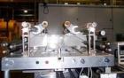 USED: FMC model WS-20 Series II horizontal wrapper. Dual land servo driven. All stainless steel wash down unit. Last ran meat patties.