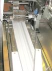 Used Fuji Model FW3400 Alpha VI Horizontal Wrapper capable of speeds from 10-100 packages per minute as now configured 1-up. Product size range: length 1.5