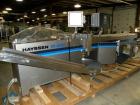 Used Hayssen Gas Fush Horizontal Wrapper, Model RT-1000 R. Capable of speeds up to 160 packages per minute. Inverted seal with Accutrac film feed system. Package size range: length 4.25