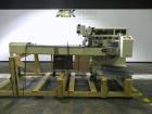 Used Ilapak Lynx Compak Model DUE Horizontal Wrapper capable of speeds up to 130 packages per minute. Has a two up sealing head and 2 speed 6' long lugged chain infeed on 9