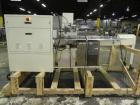 Used Ilapak Lynx Compak Model DUE Horizontal Wrapper capable of speeds up to 130 packages per minute. Has a two up sealing head and 2 speed 6' long lugged chain infeed on 9