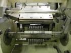 Used Ilapak Lynx Compak Model DUE Horizontal Wrapper capable of speeds up to 130 packages per minute. Has a two up sealing head and 2 speed 6' long lugged chain infeed on 9
