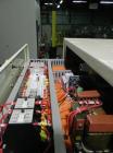 Used Ilapak Lynx Compak Model DUE Horizontal Wrapper capable of speeds up to 130 packages per minute. Has a two up sealing head and 2 speed 6' long lugged chain infeed on 9