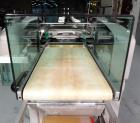 Used Exact Equipment Solo Max Automatic Stretch Wrapping Machine. Capable of speeds up to 30 ppm. Tray size from 7.1