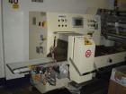 Used Otem M300DX Flowpack Wrapper.  Maximum pack height 3.5