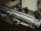 Used Otem M300DX Flowpack Wrapper.  Maximum pack height 3.5