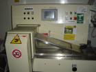 Used Otem M300DX Flowpack Wrapper.  Maximum pack height 3.5
