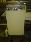 Used Otem M300DX Flowpack Wrapper. Maximum pack height 3.5