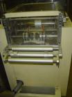 Used Otem M300DX Flowpack Wrapper. Maximum pack height 3.5