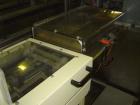 Used Otem M300DX Flowpack Wrapper. Maximum pack height 3.5