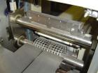 Used-Otem M300DX Flowpack Wrapper. Maximum pack height 3.5
