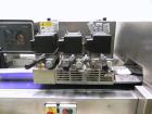 Used PFM Model Tornado Inverted Seal Horizontal Wrapper