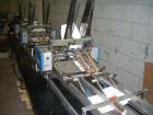 Used Pfankuch Model VP450 Series Wrapper System. Three station infeed section with mounts for three feeders. Three model 450 feeders, each equipped with 1-99 counters. One VP450 wrapper module with u...