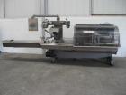 Used Rose Forgrove Flow Wrapping Machine, Model Integra 602. Stainless steel construction. Speeds up to 150 pieces per minute (depending on product size and film material). Long dwell crimping statio...