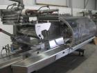 Used Rose Forgrove Flow Wrapping Machine, Model Integra 602. Stainless steel construction. Speeds up to 150 pieces per minute (depending on product size and film material). Long dwell crimping statio...