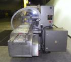 Used Rose Forgrove Integra Model RF602 Long Dwell Modified Atmosphere Horizontal Wrapper. Machine is capable of speeds up to 110 packages per minute. Has a package size range: (Width) 3/4
