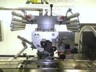 Used Rose Forgrove Integra Model RF602 Long Dwell Modified Atmosphere Horizontal Wrapper. Machine is capable of speeds up to 110 packages per minute. Has a package size range: (Width) 3/4