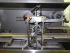 Used Rose Forgrove Integra Model RF602 Long Dwell Modified Atmosphere Horizontal Wrapper. Machine is capable of speeds up to 110 packages per minute. Has a package size range: (Width) 3/4