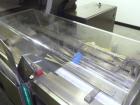 Used Rose Forgrove Integra Model RF602 Long Dwell Modified Atmosphere Horizontal Wrapper. Machine is capable of speeds up to 110 packages per minute. Has a package size range: (Width) 3/4