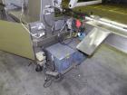 Used Rose Forgrove Integra Model RF602 Long Dwell Modified Atmosphere Horizontal Wrapper. Machine is capable of speeds up to 110 packages per minute. Has a package size range: (Width) 3/4