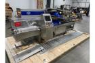 Used- SIG Horizontal Flow Wrapper, Model HBM. Wrapper is rated for speeds from 50 to 350 packages per minute. Has a 7.5