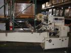 Used Sinlon Model SL-920HE Horizontal Flow Wrapper. Has print registration.