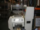 Used Sinlon Model SL-920HE Horizontal Flow Wrapper. Has print registration.