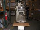 Used Sinlon Model SL-920HE Horizontal Flow Wrapper. Has print registration.