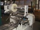 Used Sinlon Model SL-920HE Horizontal Flow Wrapper. Has print registration.