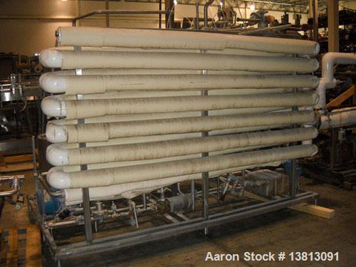 Used APV Crepaco Pasteurizer.Includes an APV plate and frame heat exchanger, model SR15-S, work order #27854. Allen Bradley 1771 P4S power supply.Micro Motion mass flow sensor 1-1/2" inlet and outlet...