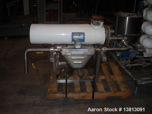 Used APV Crepaco Pasteurizer.Includes an APV plate and frame heat exchanger, model SR15-S, work order #27854. Allen Bradley 1771 P4S power supply.Micro Motion mass flow sensor 1-1/2" inlet and outlet...