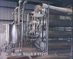 Used Cherry Burrell Ultra High Temperature (U.H.T.) Processing System. "NO BAC" spiraltherm tubular heat exchanger design previously operated at a flow rate of 2400 gallons per hour in aseptic proces...