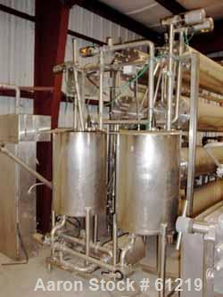 Used Cherry Burrell Ultra High Temperature (U.H.T.) Processing System. "NO BAC" spiraltherm tubular heat exchanger design previously operated at a flow rate of 2400 gallons per hour in aseptic proces...