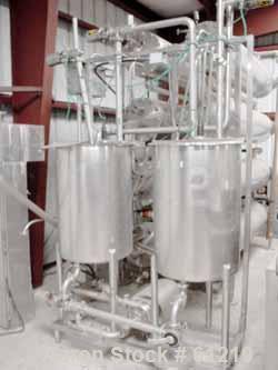 Used Cherry Burrell Ultra High Temperature (U.H.T.) Processing System. "NO BAC" spiraltherm tubular heat exchanger design previously operated at a flow rate of 2400 gallons per hour in aseptic proces...
