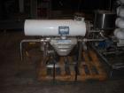 Used APV Crepaco Pasteurizer.Includes an APV plate and frame heat exchanger, model SR15-S, work order #27854. Allen Bradley 1771 P4S power supply.Micro Motion mass flow sensor 1-1/2