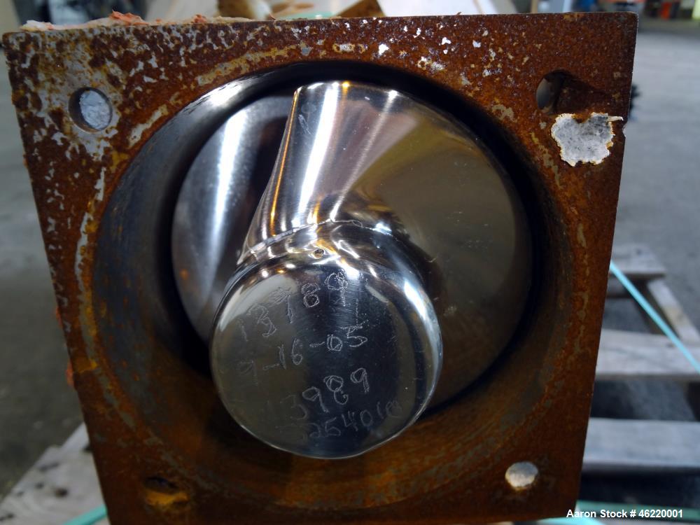 Used Cincinnati Milacron Crammer Feeder. Approximately 5" diameter 304 stainless steel vertical feed screw. Carbon steel slant cone hopper approximately 28" diameter x 34" deep. Screw driven by a 3 h...