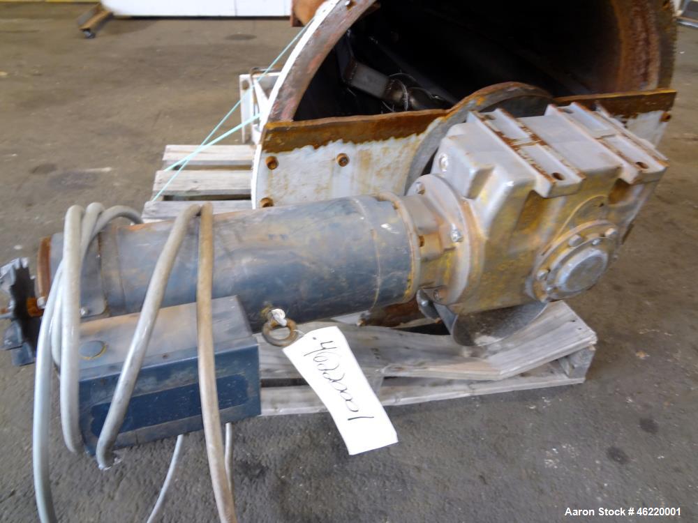 Used Cincinnati Milacron Crammer Feeder. Approximately 5" diameter 304 stainless steel vertical feed screw. Carbon steel slant cone hopper approximately 28" diameter x 34" deep. Screw driven by a 3 h...