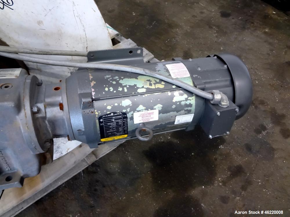 Used Cincinnati Milacron Crammer Feeder. Approximately 5" diameter 304 stainless steel vertical feed screw. Carbon steel slant cone hopper approximately 28" diameter x 34" deep. Screw driven by a 3 h...